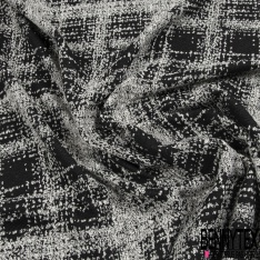 Maille gaufrée motif quadrillage indigo fond noir