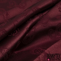 Satin jacquard polyester élasthanne motif léopard ton sur ton rouge