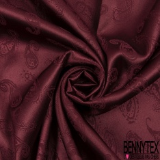 Satin jacquard polyester élasthanne motif léopard ton sur ton rouge