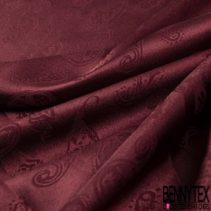 Satin jacquard polyester élasthanne motif léopard ton sur ton rouge